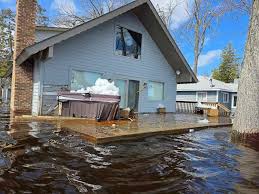 Ice Slabs Smash Through Black Lake Homes in Cheboygan County as April Flooding Reached Record Levels, and Most Families Have No Coverage